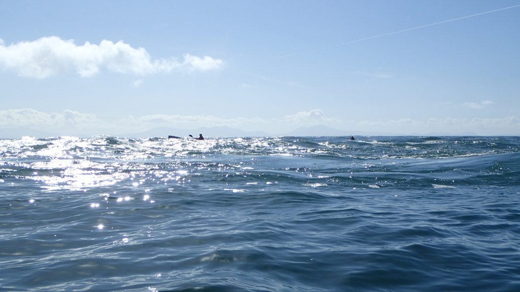 Kayakers playing in Rhoscolyn