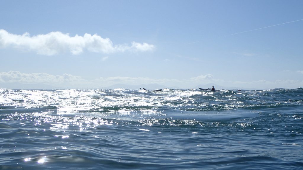 Kayakers playing in Rhoscolyn