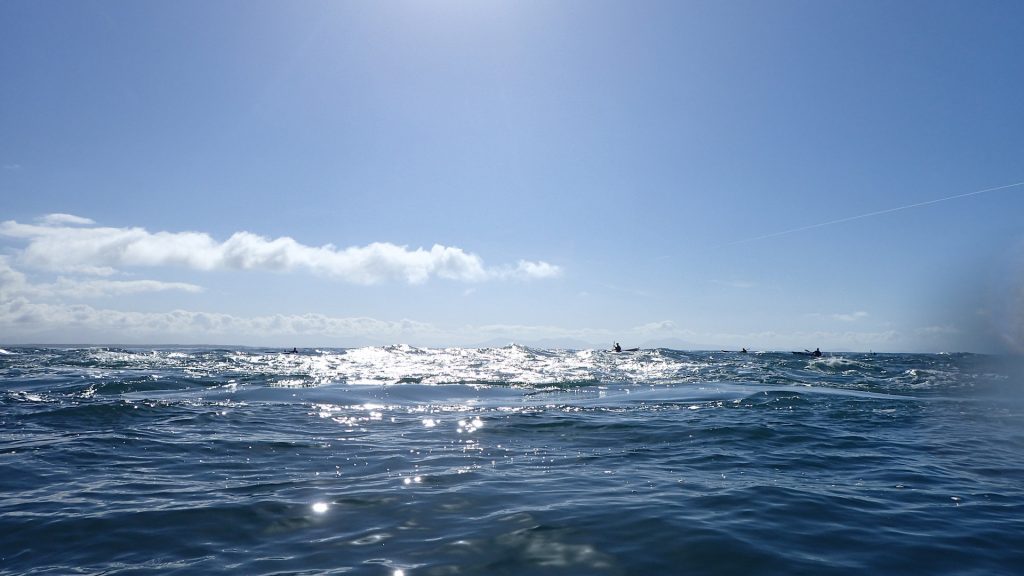 Kayakers playing in Rhoscolyn