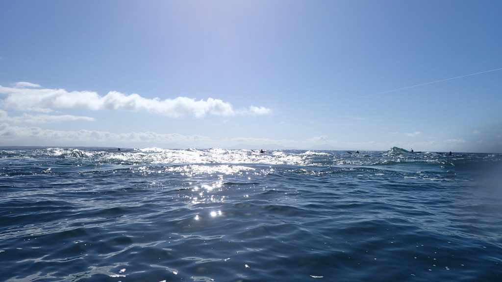 Kayakers playing in Rhoscolyn
