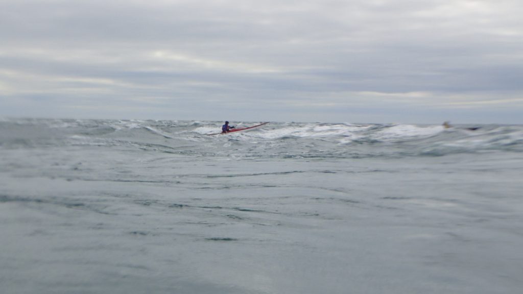 Some kayakers running the outer race