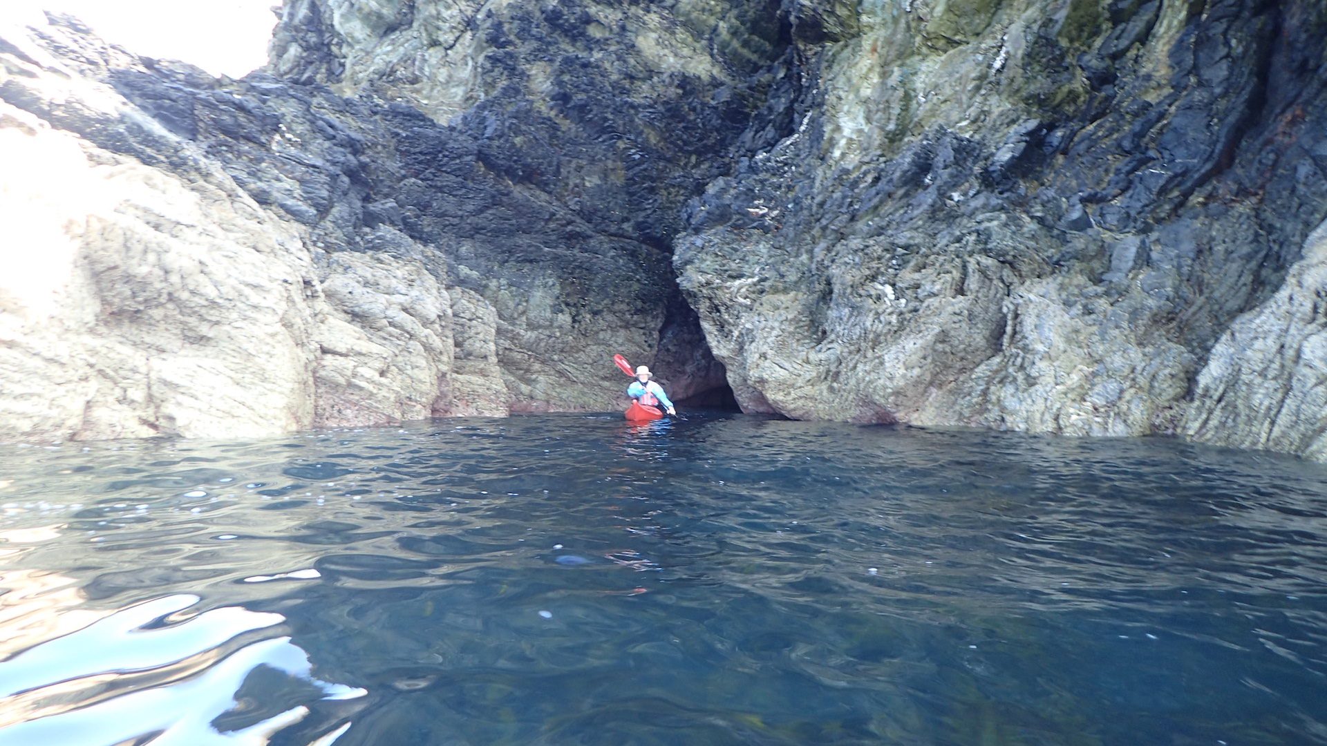 Blow hole cave at low water with Owain